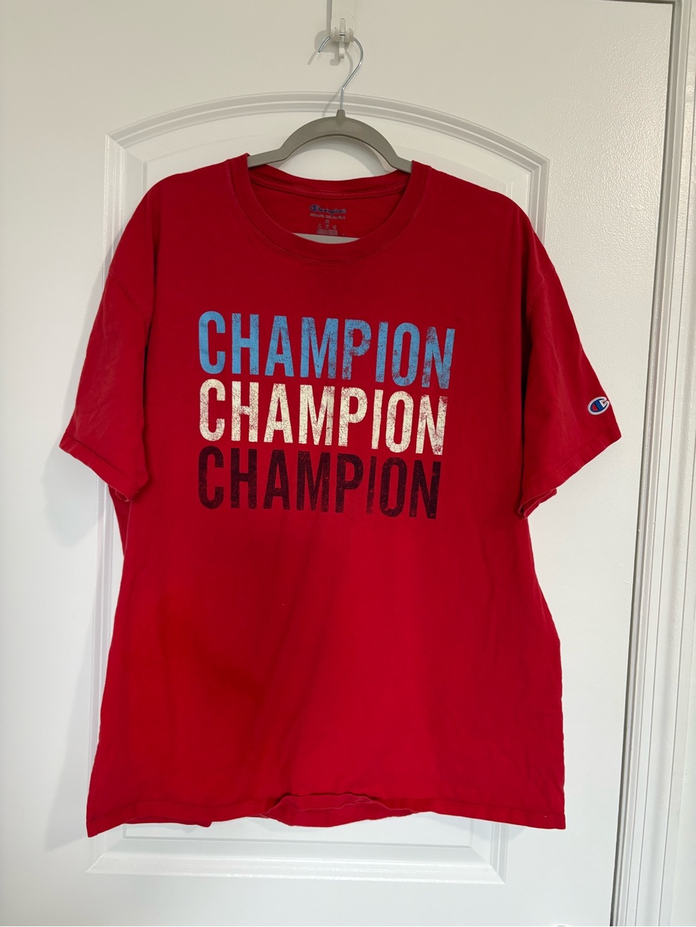 Champion Red Tee with Multicolor 'CHAMPION' Stacked Logo